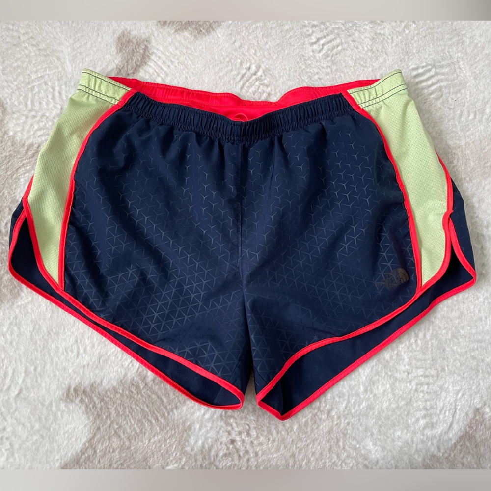 The north face women’s flash dry running shorts navy and neon